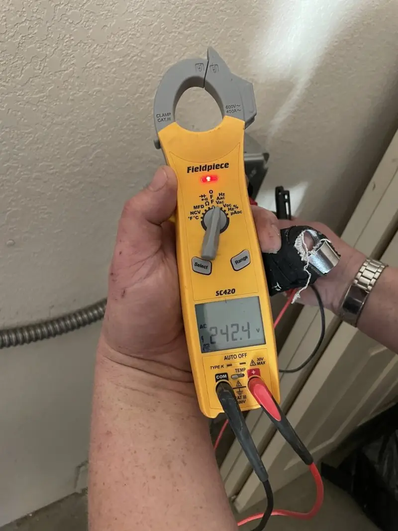 Voltage testing with clamp meter during Aluminum Wiring Replacement in Aspen Hill